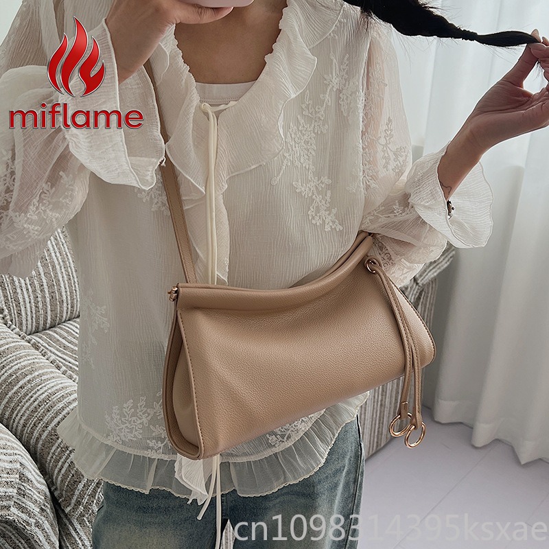 ヴィンテージレザーショルダーバッグ、しっかりとしたシルエット - Structured Handbag Work のレビューと価格