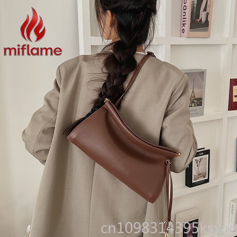 ヴィンテージレザーショルダーバッグ、しっかりとしたシルエット - Structured Handbag Work のレビューと価格